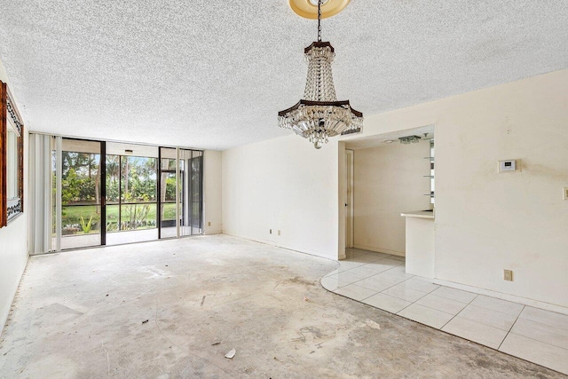 unfurnished living room with a textured ceiling