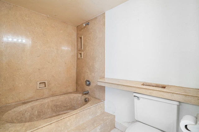 bathroom with tile patterned floors, a textured ceiling, and vanity