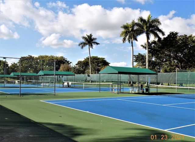 view of tennis court with basketball court