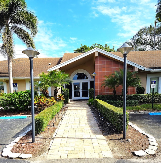 entrance to property featuring french doors