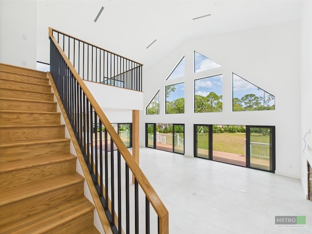 13613 157th Ct N, Jupiter, FL 33478 - staircase featuring high vaulted ceiling