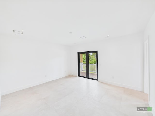13613 157th Ct N, Jupiter, FL 33478 - spare room featuring baseboards and recessed lighting
