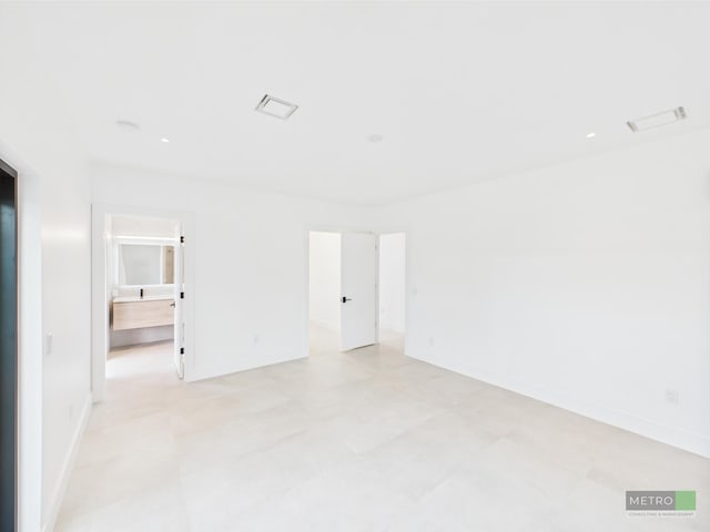 13613 157th Ct N, Jupiter, FL 33478 - spare room featuring baseboards and light flooring
