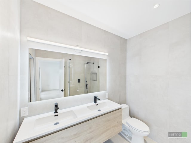 13613 157th Ct N, Jupiter, FL 33478 - bathroom featuring a stall shower, toilet, and double vanity