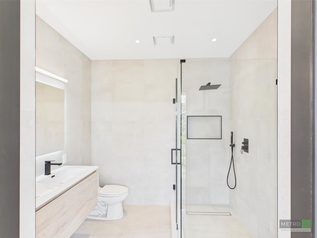 13613 157th Ct N, Jupiter, FL 33478 - full bathroom featuring a stall shower, toilet, vanity, and tile patterned floors