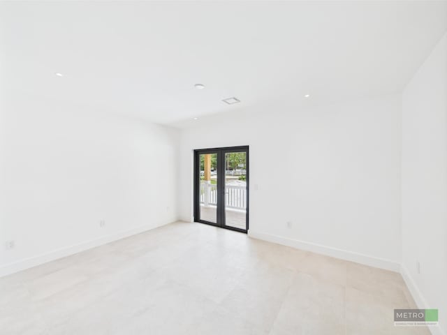 13613 157th Ct N, Jupiter, FL 33478 - empty room with recessed lighting and baseboards