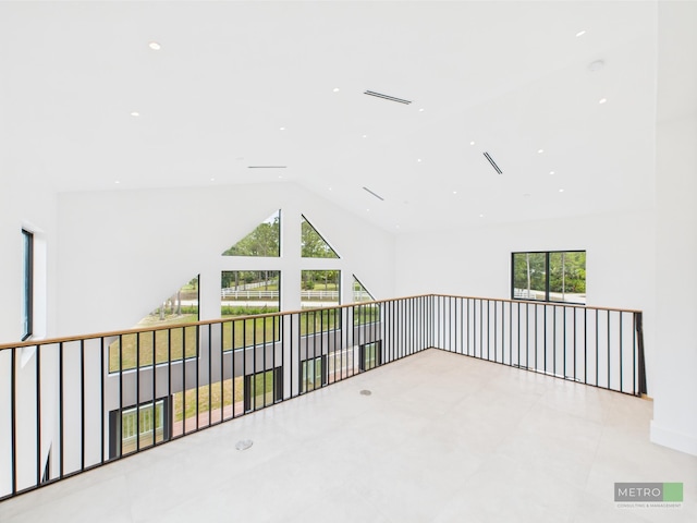 13613 157th Ct N, Jupiter, FL 33478 - bonus room featuring plenty of natural light, vaulted ceiling, and recessed lighting