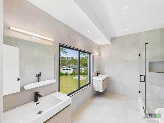 13613 157th Ct N, Jupiter, FL 33478 - bathroom with a shower stall, two vanities, tile patterned floors, recessed lighting, and a soaking tub
