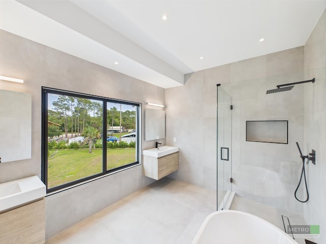 13613 157th Ct N, Jupiter, FL 33478 - full bath with a soaking tub, vanity, a stall shower, and recessed lighting