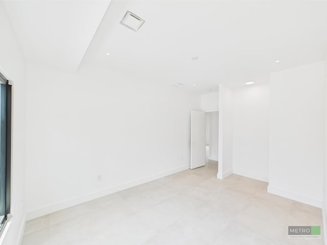 13613 157th Ct N, Jupiter, FL 33478 - unfurnished room with baseboards and recessed lighting
