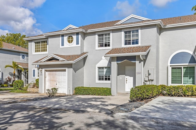 view of front of property featuring a garage