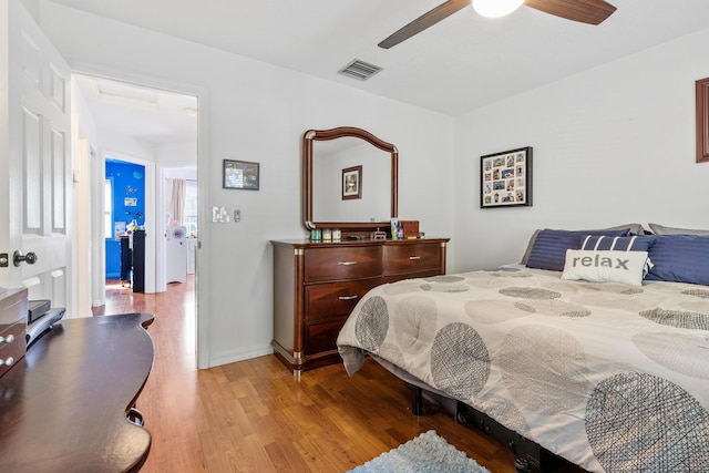 bedroom featuring light hardwood / wood-style flooring and ceiling fan