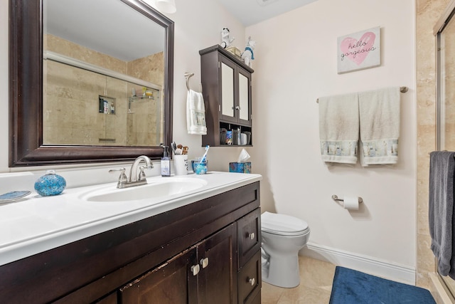 bathroom with tile patterned flooring, vanity, toilet, and a shower with shower door