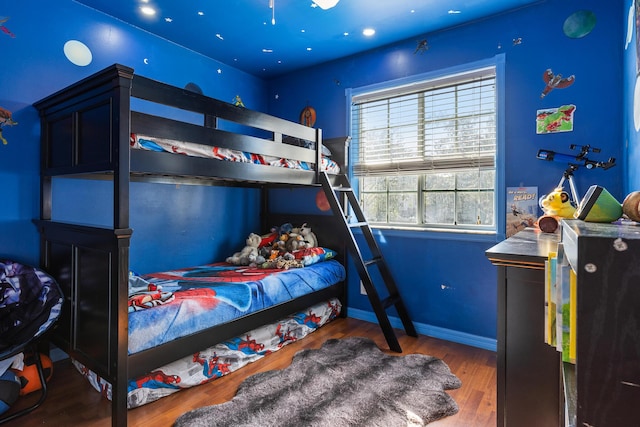 bedroom featuring dark hardwood / wood-style floors