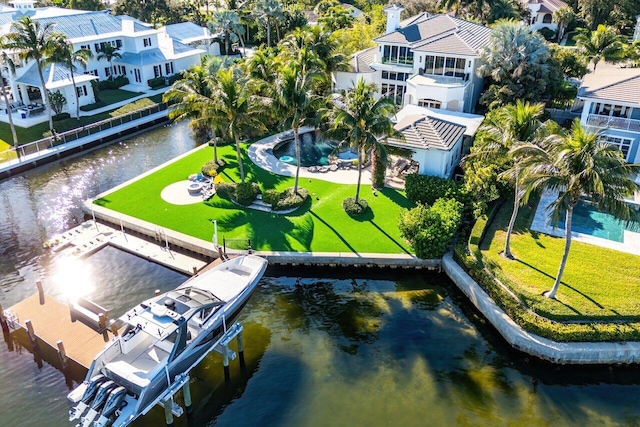 drone / aerial view featuring a water view