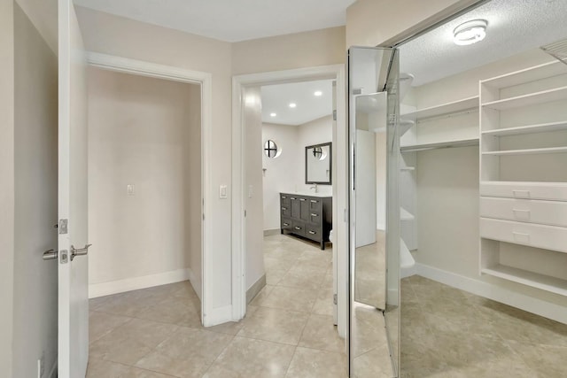 interior space featuring light tile patterned floors