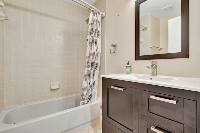 bathroom with vanity and shower / bath combo with shower curtain