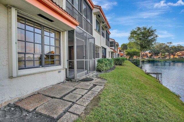 view of yard with a water view