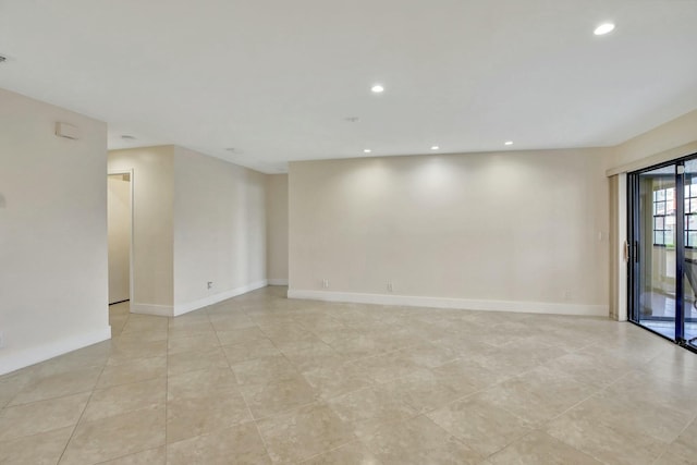 empty room with light tile patterned flooring