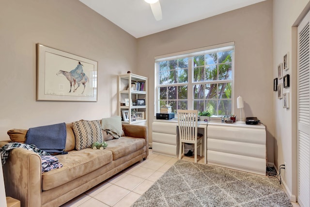 interior space with ceiling fan