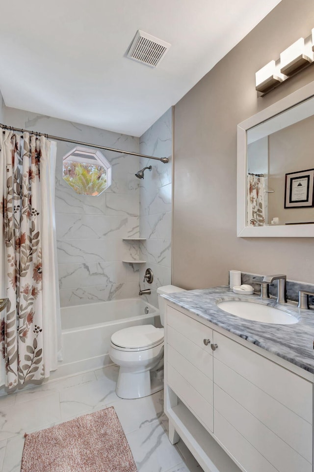 full bathroom with shower / tub combo, vanity, and toilet