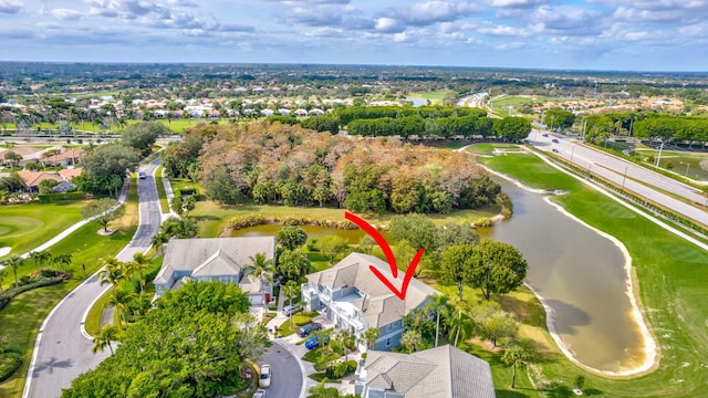 drone / aerial view featuring a water view