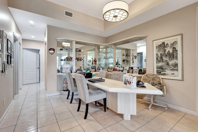 dining area with light tile patterned flooring