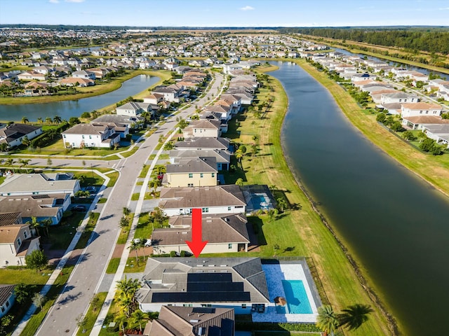 drone / aerial view featuring a water view