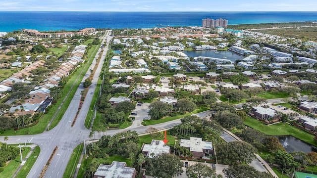 drone / aerial view with a water view