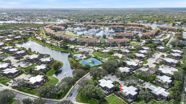 birds eye view of property featuring a water view