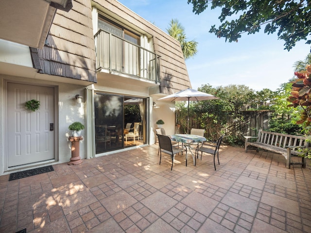 view of patio with a balcony