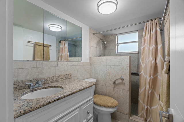 bathroom featuring vanity, backsplash, a shower with curtain, toilet, and tile walls