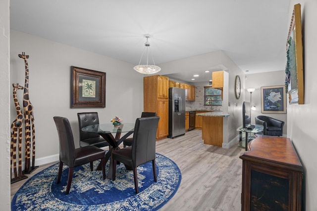 dining area featuring light hardwood / wood-style floors