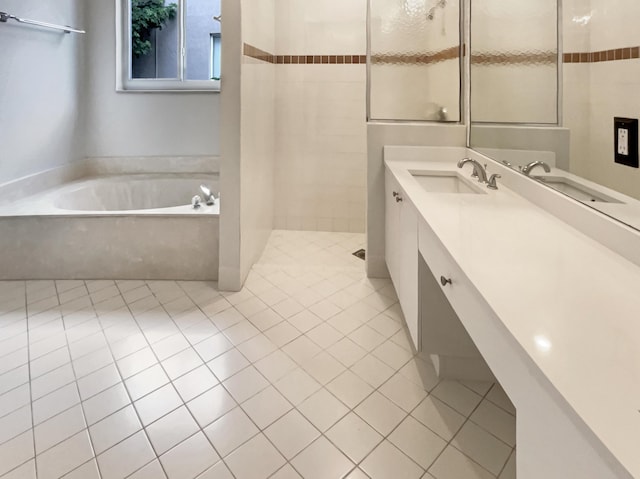 bathroom featuring tile patterned flooring, vanity, and independent shower and bath