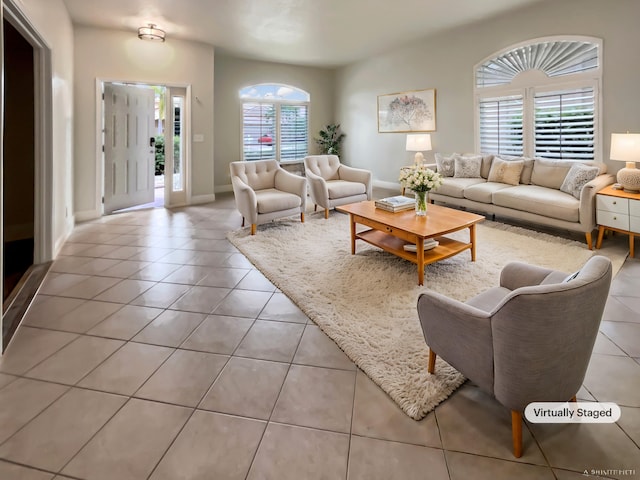 tiled living room with a wealth of natural light