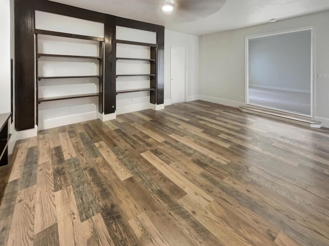 unfurnished living room with wood-type flooring