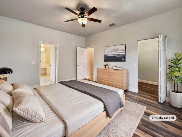 bedroom featuring dark hardwood / wood-style floors and ceiling fan