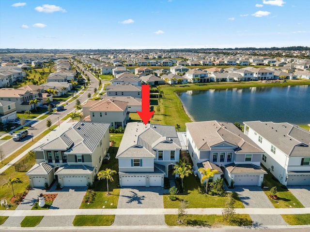 aerial view featuring a water view