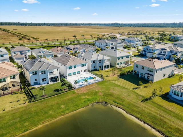 bird's eye view featuring a water view and a rural view