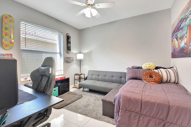 bedroom featuring ceiling fan and light tile patterned floors