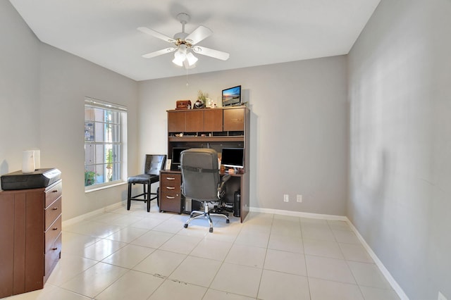 office featuring ceiling fan and light tile patterned flooring