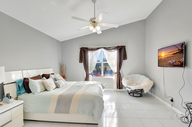 bedroom featuring vaulted ceiling and ceiling fan