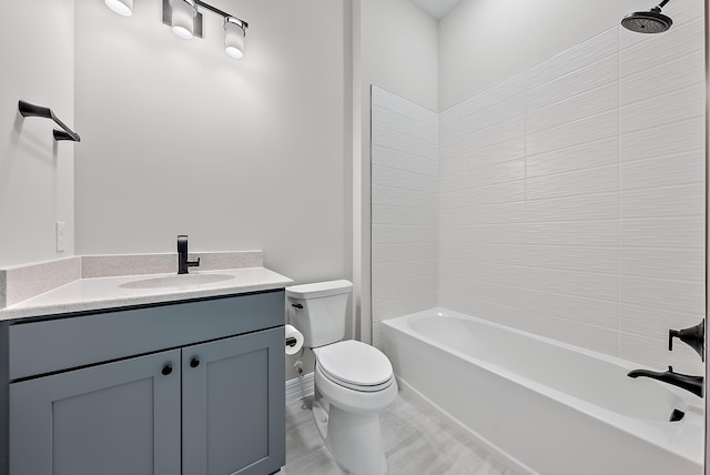 full bathroom with shower / washtub combination, vanity, and toilet