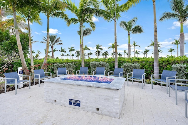 view of patio / terrace featuring an outdoor fire pit