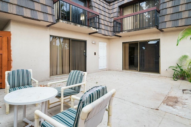 view of patio with a balcony