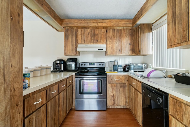 kitchen featuring a textured ceiling, dark hardwood / wood-style floors, stainless steel electric range, and black dishwasher