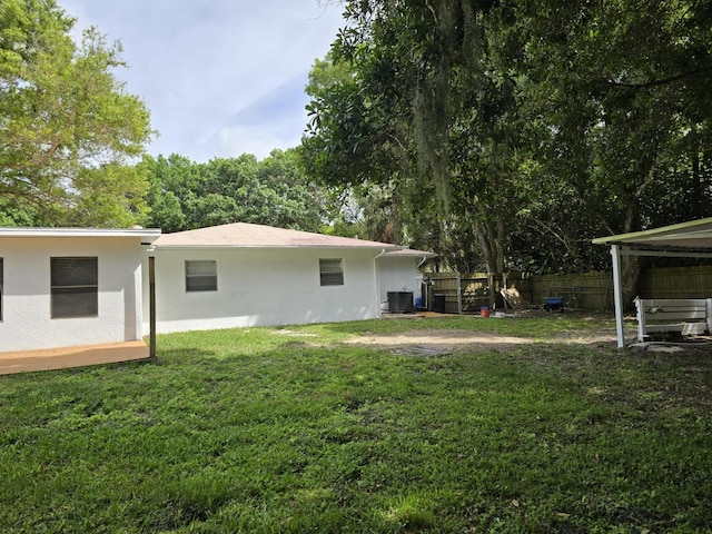 view of yard with central AC