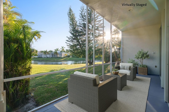 exterior space with a water view and a yard