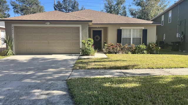 ranch-style home with a front yard and a garage