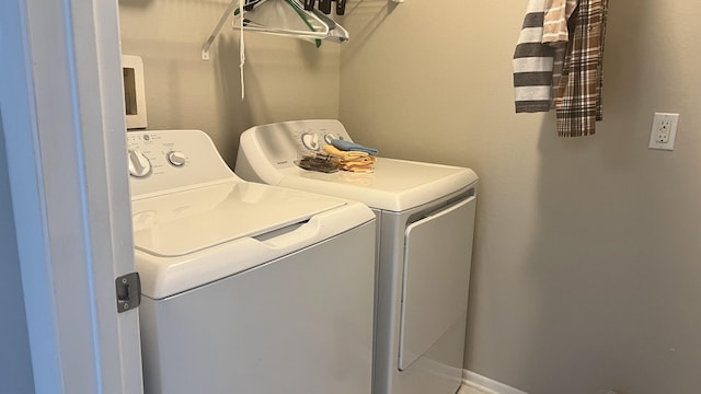 laundry area featuring washer and clothes dryer